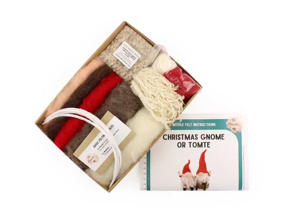 Craft kit with materials and instructions for making  'Christmas Gnome or Tomte' on a white background